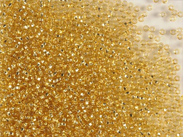 50g Rocailles 11/0 lt. Topaz Silver lined 50g Rocailles 11/0 lt. Topaz Silver lined